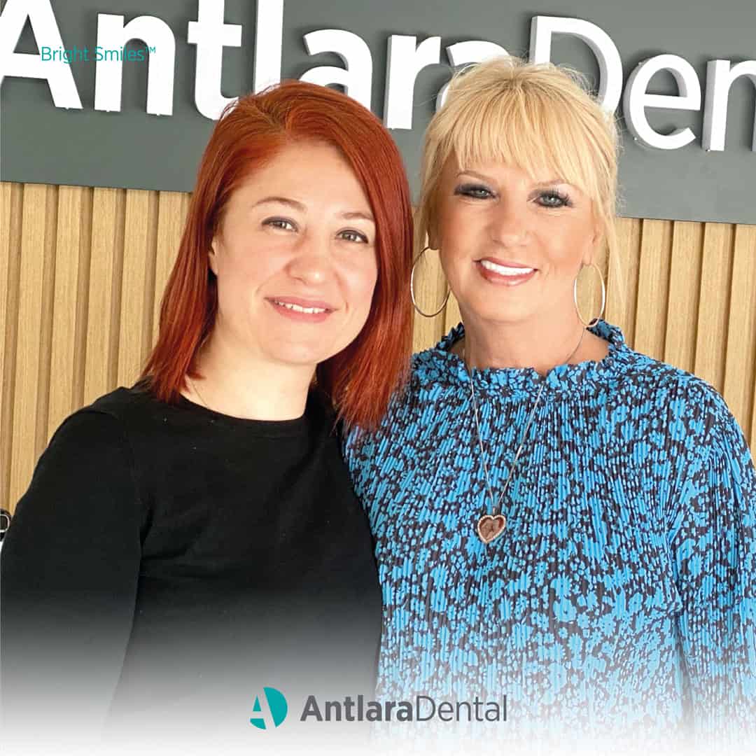 Dt. Dilek and patient gives pose for camera following zirconia crown in Antalya